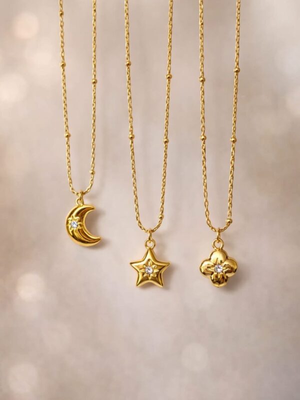 collar bombita, estrella, luna, trebol acero dorado con extensión