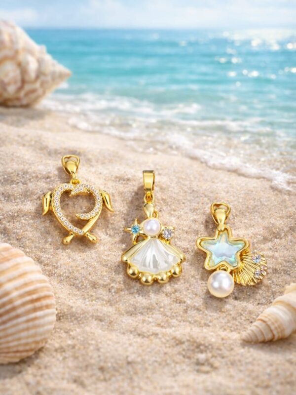 dijes marinos acero dorado