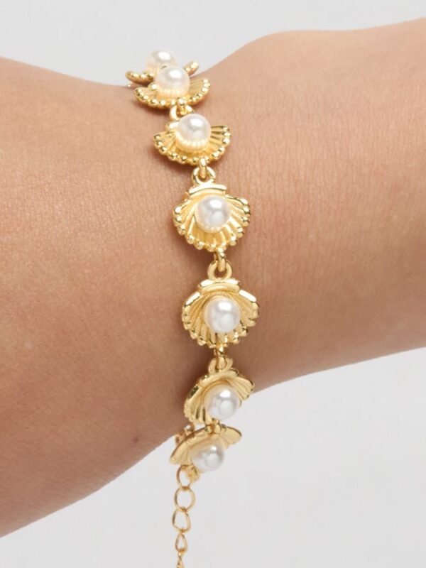 pulsera conchita acero dorado perlas