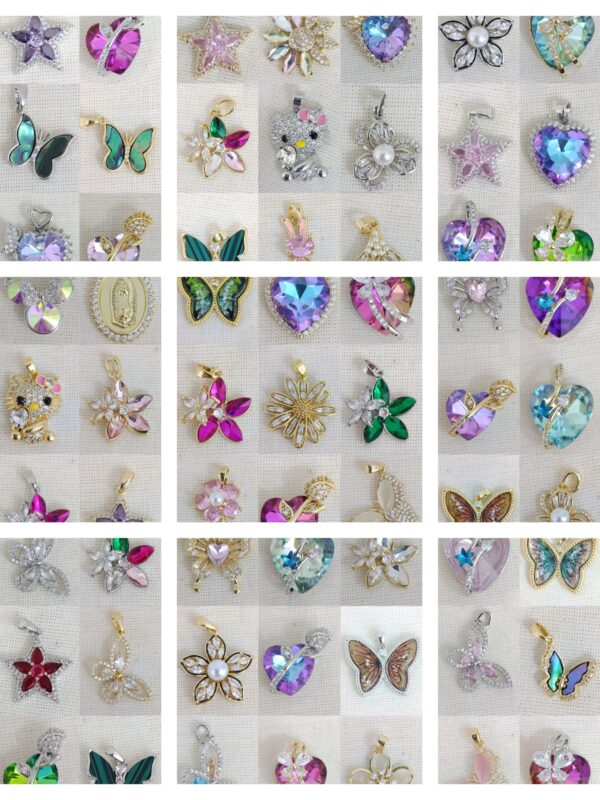 dijes varios modelos flores, mariposa,  corazon, estrella acero dorado y plateado