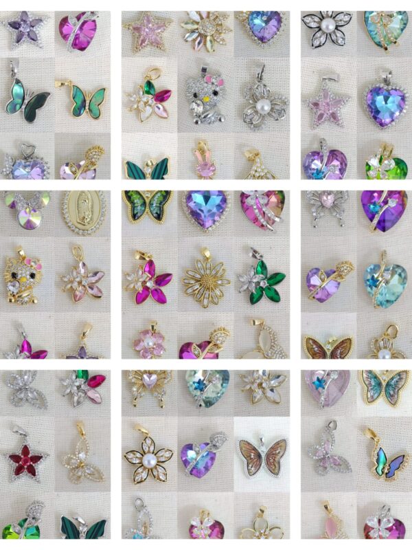 dijes varios modelos flores, mariposa,  corazon, estrella acero dorado y plateado