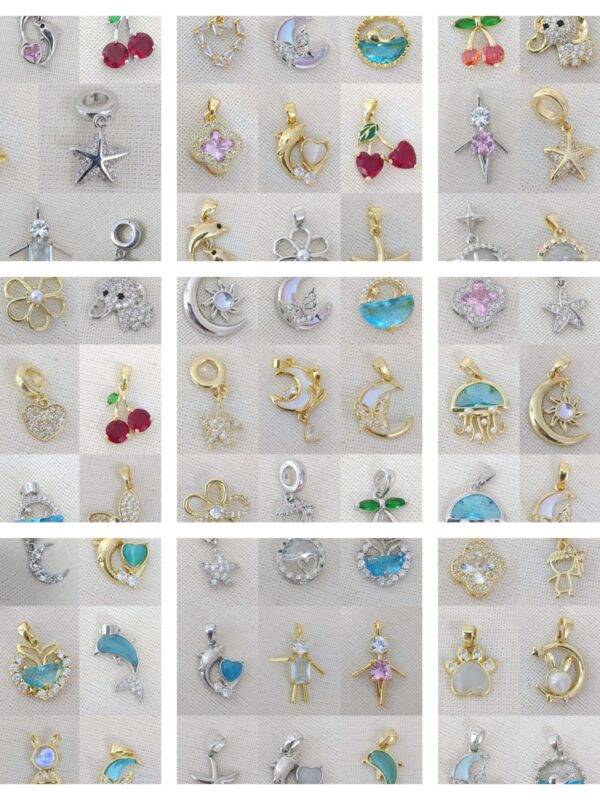 dijes varios modelos flores, mariposa,  corazon, estrella acero dorado y plateado