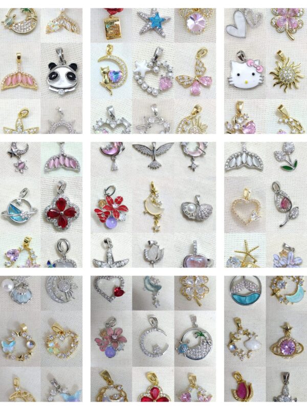 dijes varios modelos flores, mariposa,  corazon, estrella acero dorado y plateado