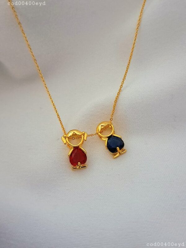 dije niño y niño acero dorado