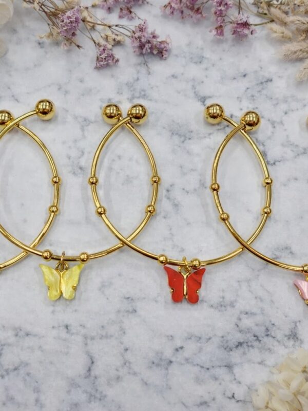 0f4bf2f5-1790-48b3-aee6-ea4d50dc590a pulsera regulable mariposa acero dorado