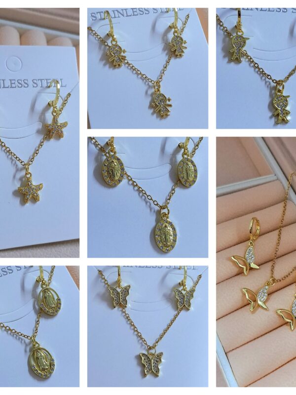 2026/02/1002119988-scaled.jpg set marino , mariposa, virgen, niño , niña acero dorado, juegos