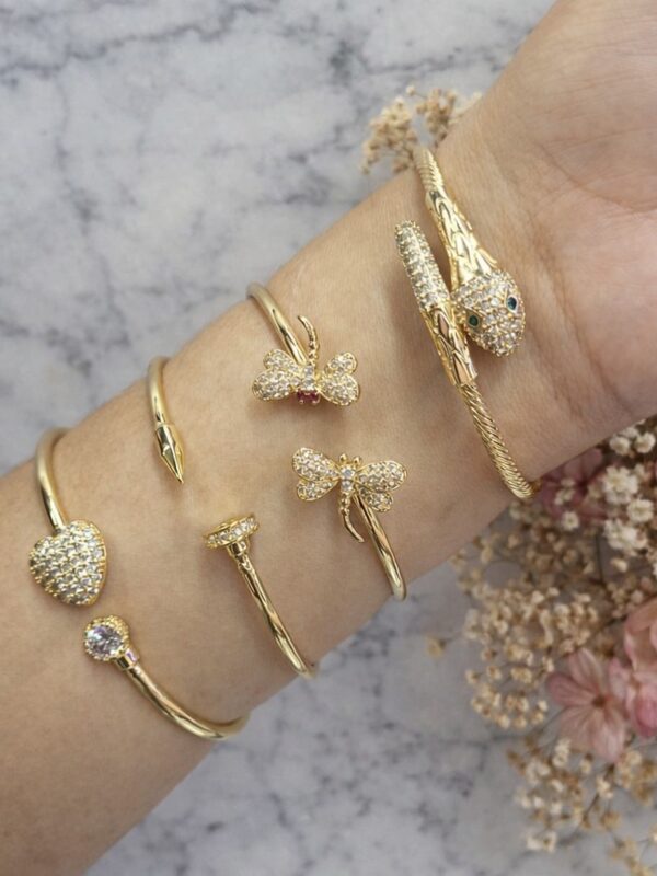 48274a48-cd21-4ecc-bc4b-645d3c57288f pulseras regulables acero dorado