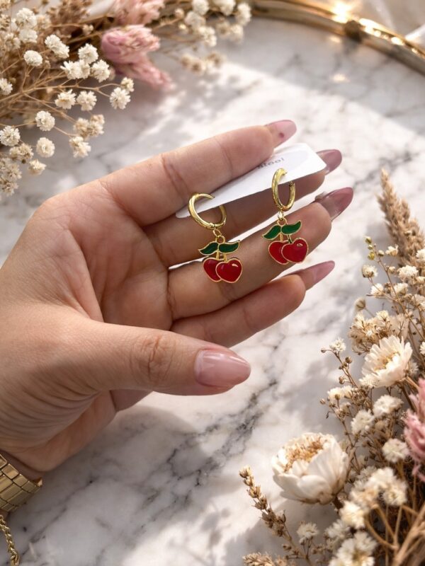 6eebf2a4-0598-466c-b20a-bac1eccd2248 arete cereza acero dorado