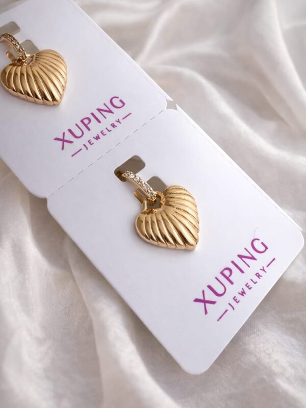 2026/02/IMG-20260129-WA0244.jpg Dije corazón, con circones xuping jewerly rose