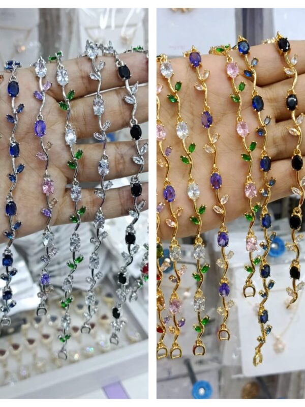 IMG-20260219-WA0000 Pulsera tulipanes acero dorado y plateado