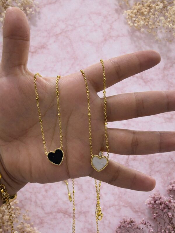 WhatsApp Image 2026-02-18 at 10.42.37 AM collar corazones cadena bombita acero dorado