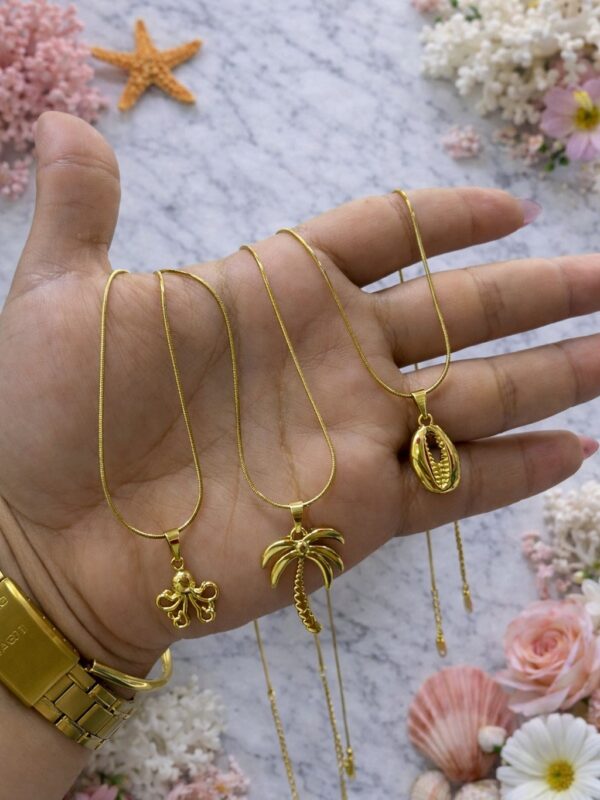 collares marinos acero dorado