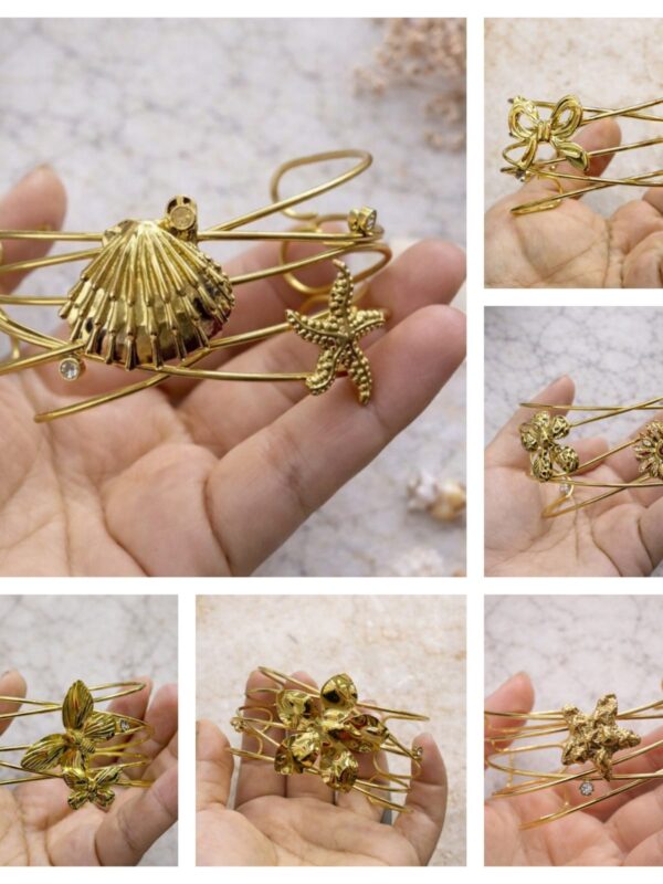 ff15fe58-6444-4297-b8dc-7516c7d4a09e pulseras flores, marinos, lazos,mariposa regulables acero dorado