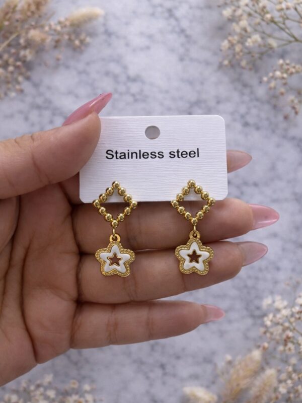 0af26a02-a06f-4724-9d0e-3a37360ff218 arete estrella acero dorado