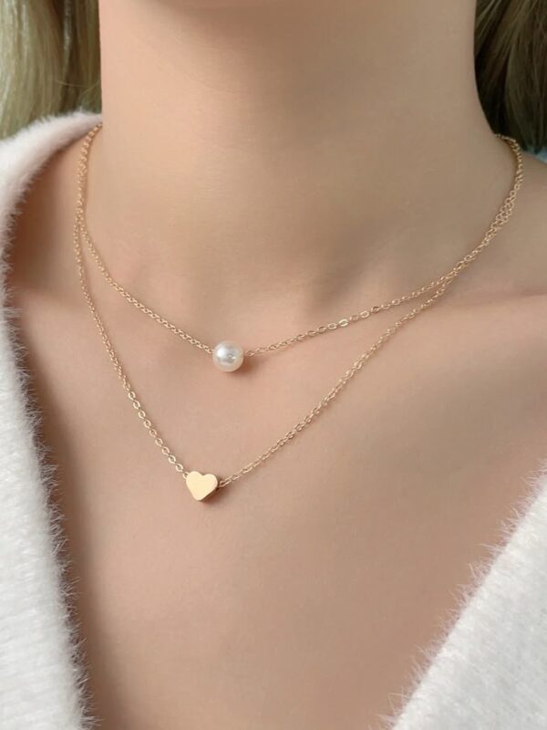 2026/03/1000230098.jpg collar perla de río naturales acero dorado y plateado