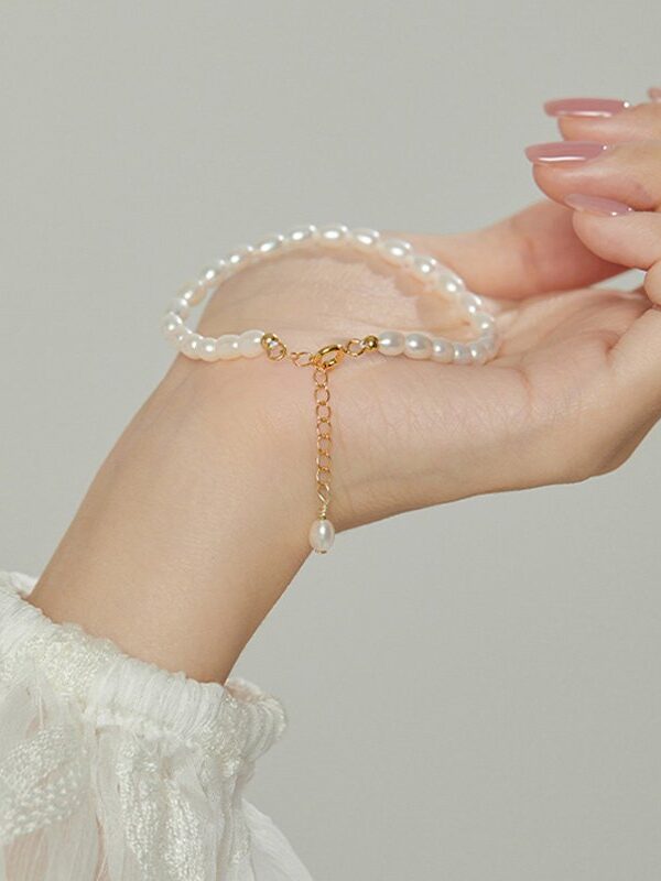 pulsera perlas de rio naturales acero dorado y plateado