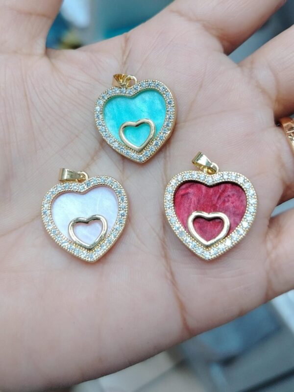 2026/04/IMG-20260402-WA0101.jpg dijes corazón acero dorado, mamá