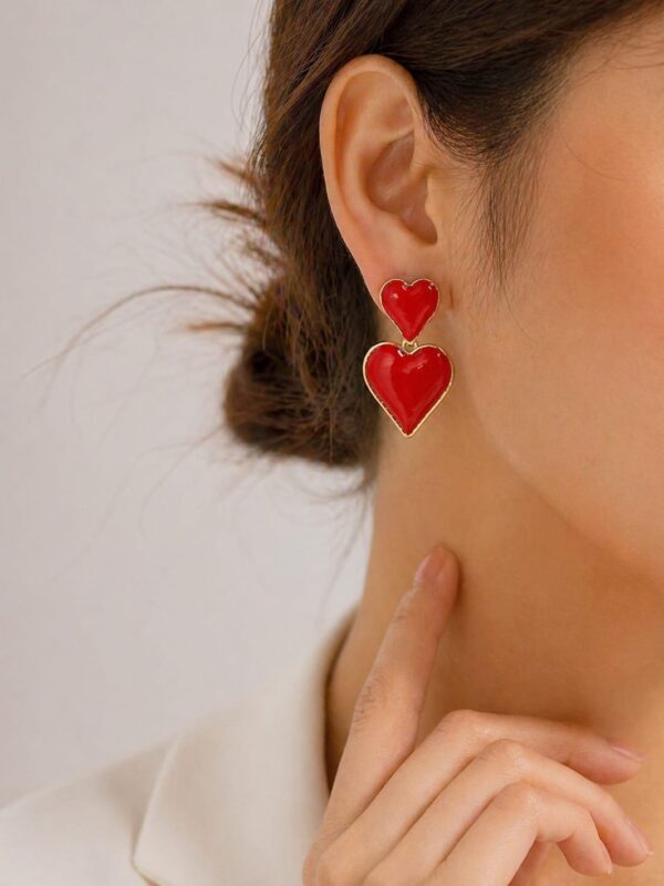 arete corazón rojo acero dorado