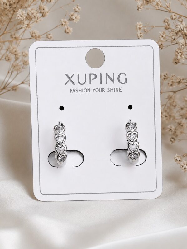 c0f300b8-6630-47e3-9654-2773cd27dac5 arete corazon circon xuping jewerly plateado