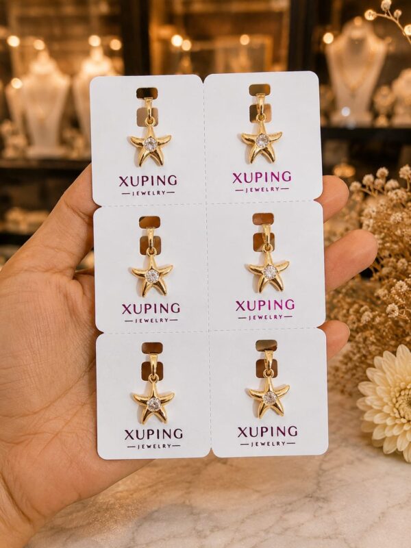 2026/08/IMG-20260820-WA0335.jpg dijes estrella con punto de luz xuping jewerly rose