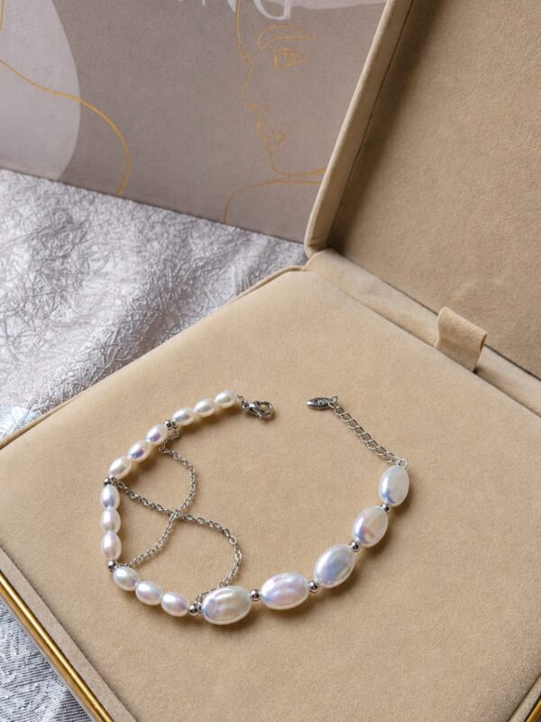 WhatsApp Image 2026-08-05 at 7.11.05 PM Pulsera plateada perla XUPING JEWERLY - RX