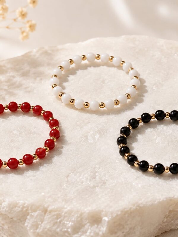 WhatsApp Image 2026-08-06 at 7.26.01 PM (3) pulsera piedras naturales , rodio dorado. rojo , negro, blanco. son elasticas